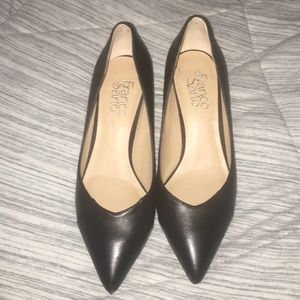 Pointed low black high heels